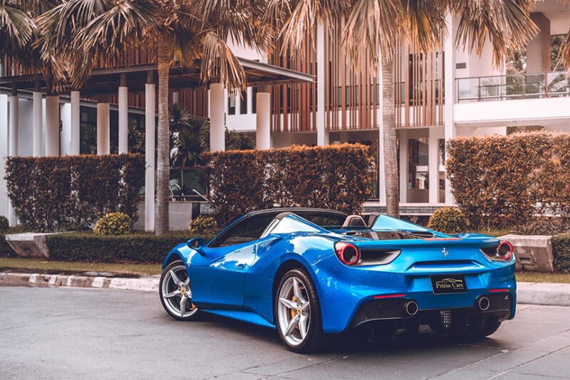 Ferrari 488 Spider blue roof down rear view — Prime Cars Rental Bangkok