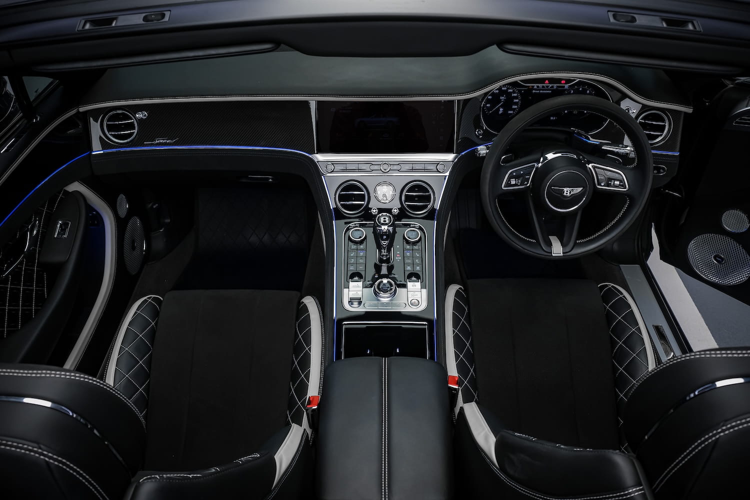 Wood Veneer Panel ภายใน Bentley GT Speed — Handcrafted Real Wood Trim Crewe | Bentley GT Speed real wood veneer panel handcrafted Crewe interior detail