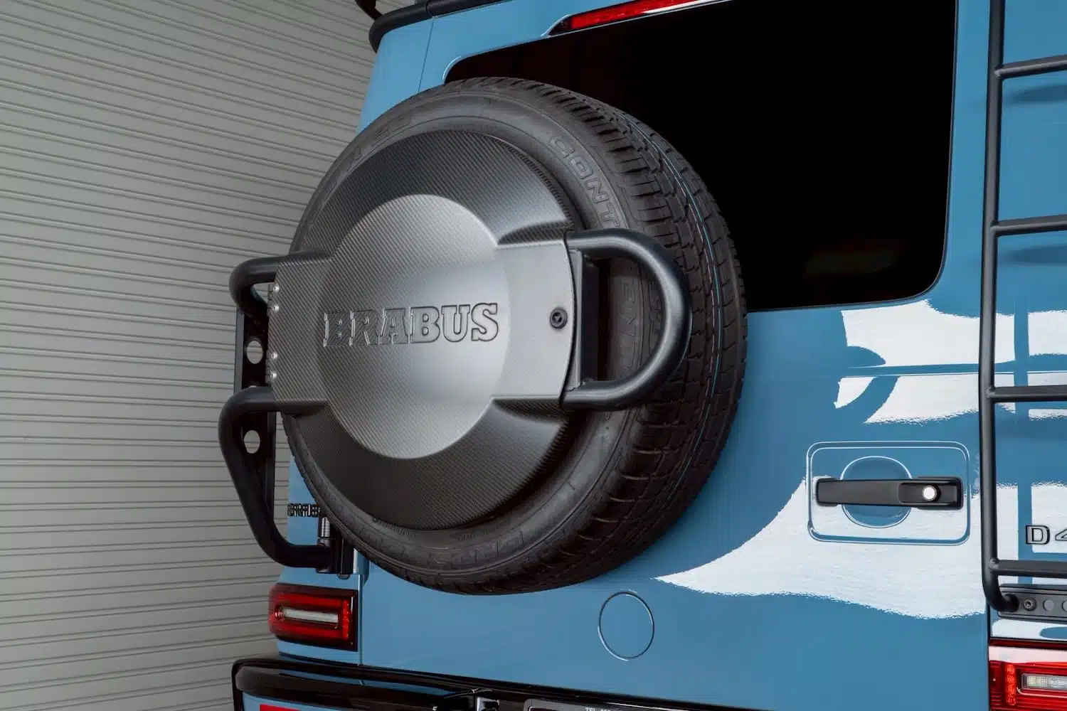 ฝาครอบยางอะไหล่สลัก BRABUS G Wagon D40 Adventure — เช่ารถเบนซ์ G-Class | Brabus embossed spare wheel cover G-Wagon D40 Adventure