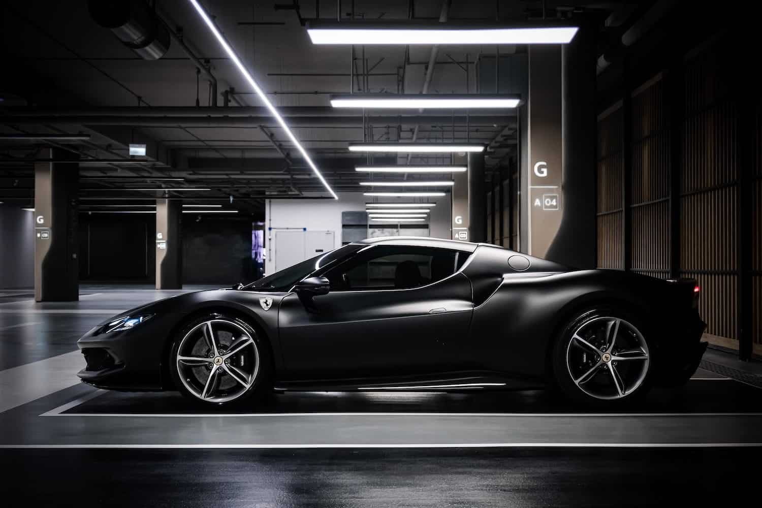 Ferrari 296 GTB Matte Black side profile — Prime Cars Rental Bangkok | Ferrari 296 GTB สีดำด้าน มุมด้านข้าง